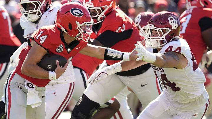 Georgia football QB Gunner Stockton scrambles against Oklahoma Sooners. Georgia football QB Gunner Stockton scrambles against Oklahoma Sooners.
