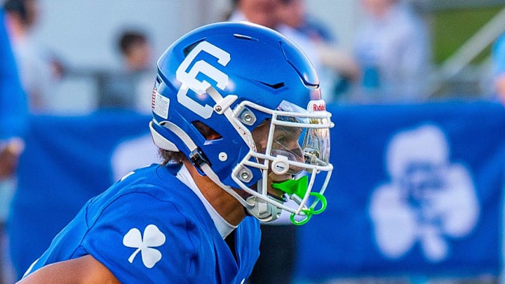 Detroit Catholic Central's Samson Gash returns a punt during a football game on Friday, Aug. 29, 2025. Detroit Catholic Central's Samson Gash returns a punt during a football game on Friday, Aug. 29, 2025.
