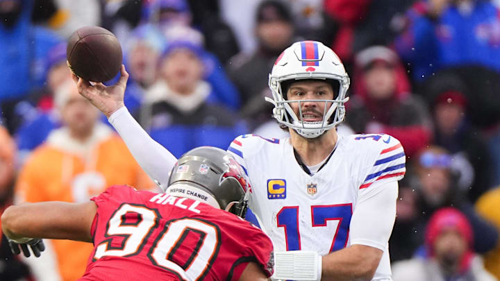  Buffalo Bills quarterback Josh Allen (17) passes against Tampa Bay Buccaneers defensive end Logan Hall (90) 
