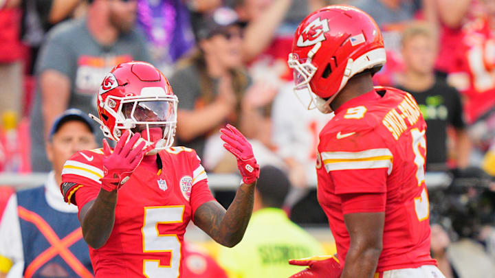 Sep 28, 2025; Kansas City, Missouri, USA; Kansas City Chiefs wide receiver Hollywood Brown (5) celebrates after scoring a touchdown during the fourth quarter against the Baltimore Ravens at GEHA Field at Arrowhead Stadium. Mandatory Credit: Jay Biggerstaff-Imagn Images