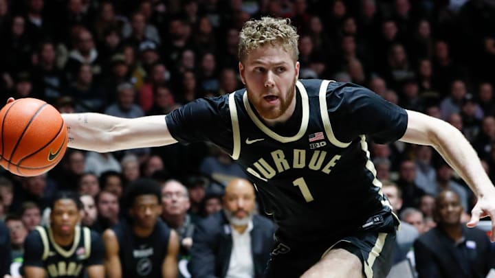 Purdue Boilermakers forward Caleb Furst (1) grabs a rebound