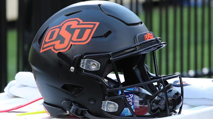 Oct 25, 2025; Lubbock, Texas, USA;  A general view of an Oklahoma State Cowboys helmet on the bench in the second half of the game against the Texas Tech Red Raiders at Jones AT&T Stadium. 
