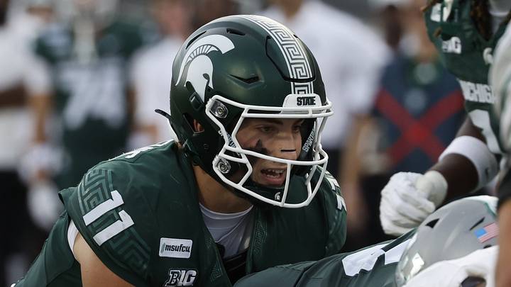 Michigan State quarterback Alessio Milivojevic takes a snap against Eastern Michigan at Spartan Stadium on Saturday, Sept. 12, 2026.