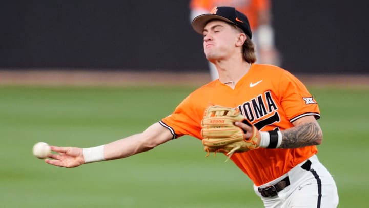Oklahoma State infielder Brock Thompson throws the baseball. 