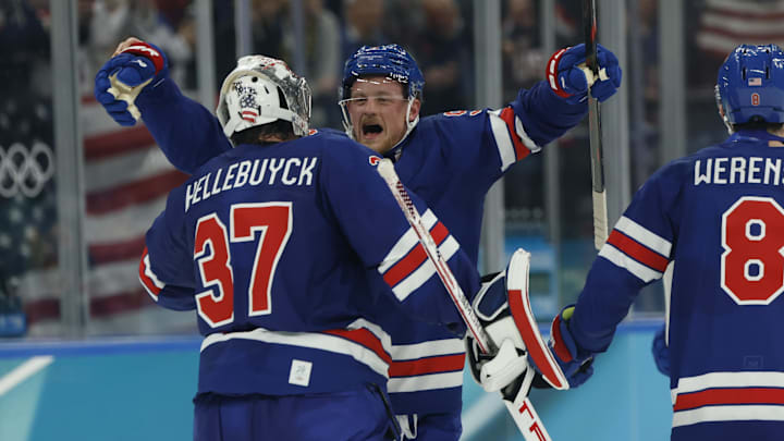 Feb 18, 2026; Milan, Italy; Connor Hellebuyck (37) of the United States and Jack Eichel (9) of the United States celebrate after defeating Sweden in a men's ice hockey quarterfinal during the Milano Cortina 2026 Olympic Winter Games at Milano Santagiulia Ice Hockey Arena. Mandatory Credit: Geoff Burke-Imagn Images Feb 18, 2026; Milan, Italy; Connor Hellebuyck (37) of the United States and Jack Eichel (9) of the United States celebrate after defeating Sweden in a men's ice hockey quarterfinal during the Milano Cortina 2026 Olympic Winter Games at Milano Santagiulia Ice Hockey Arena. Mandatory Credit: Geoff Burke-Imagn Images