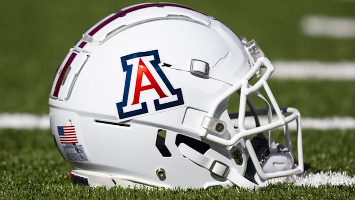 Nov 25, 2022; Tucson, Arizona, USA; Detailed view of an Arizona Wildcats helmet on the field during the Territorial Cup at Arizona Stadium. Mandatory Credit: Mark J. Rebilas-Imagn Images