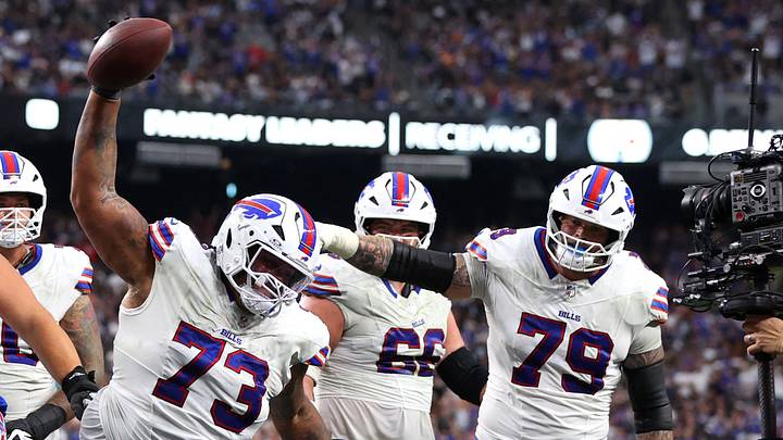 Oct 18, 2026; Paradise, Nevada, USA;  Buffalo Bills offensive tackle Dion Dawkins (73) reacts after a touchdown in the fourth quarter against the Las Vegas Raiders at Allegiant Stadium.  Mandatory Credit: Christopher Trim-Imagn Images