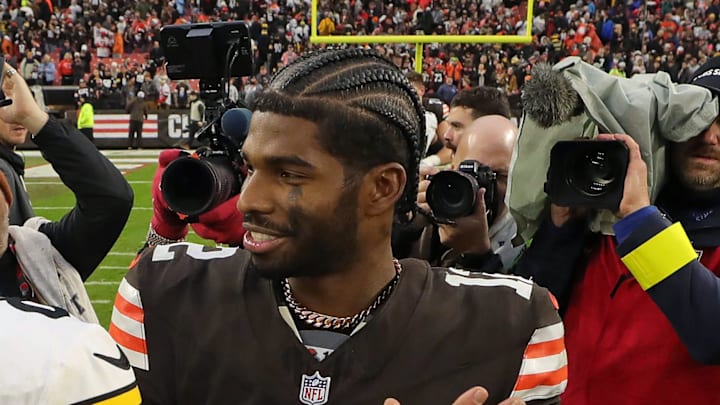 Browns quarterback Shedeur Sanders shakes hands with Pittsburgh Steelers quarterback Aaron Rodgers after a game won by the Browns, Dec. 28, 2025, in Cleveland.
