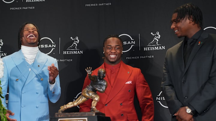 Dec 14, 2024; New York, NY, USA; From left, Heisman Trophy nominees Oregon Ducks quarterback Dillon Gabriel, Colorado Buffaloes wide receiver/cornerback Travis Hunter, Boise State Broncos running back Ashton Jeanty and Miami Hurricanes quarterback Cam Ward pose for a photo during a press conference before the 2024 Heisman Trophy Presentation. Mandatory Credit: Lucas Boland-Imagn ImagesΩ Dec 14, 2024; New York, NY, USA; From left, Heisman Trophy nominees Oregon Ducks quarterback Dillon Gabriel, Colorado Buffaloes wide receiver/cornerback Travis Hunter, Boise State Broncos running back Ashton Jeanty and Miami Hurricanes quarterback Cam Ward pose for a photo during a press conference before the 2024 Heisman Trophy Presentation. Mandatory Credit: Lucas Boland-Imagn ImagesΩ