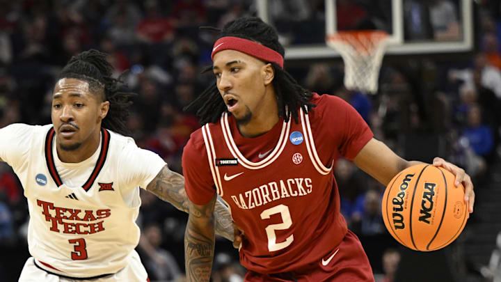 Mar 27, 2025; San Francisco, CA, USA; Arkansas Razorbacks guard Boogie Fland (2) drives to the hoop past Texas Tech Red Raiders guard Elijah Hawkins (3) during the first half during a West Regional semifinal of the 2025 NCAA tournament at Chase Center. Mandatory Credit: Eakin Howard-Imagn Images Mar 27, 2025; San Francisco, CA, USA; Arkansas Razorbacks guard Boogie Fland (2) drives to the hoop past Texas Tech Red Raiders guard Elijah Hawkins (3) during the first half during a West Regional semifinal of the 2025 NCAA tournament at Chase Center. Mandatory Credit: Eakin Howard-Imagn Images