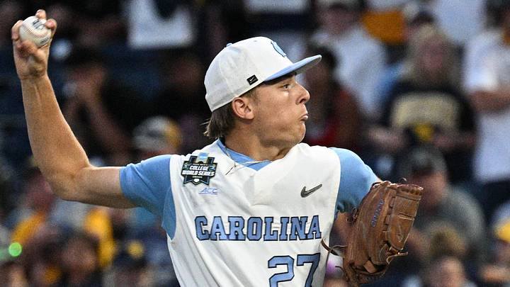 Jun 14, 2026; Omaha, NE, USA; North Carolina Tar Heels pitcher Caden Glauber (27) throws against the West Virginia Mountaineers during the ninth inning at Charles Schwab Field. Mandatory Credit: Steven Branscombe-Imagn Images Jun 14, 2026; Omaha, NE, USA; North Carolina Tar Heels pitcher Caden Glauber (27) throws against the West Virginia Mountaineers during the ninth inning at Charles Schwab Field. Mandatory Credit: Steven Branscombe-Imagn Images