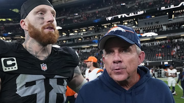 Dec 7, 2025; Paradise, Nevada, USA;  Las Vegas Raiders defensive end Maxx Crosby (98) and Denver Broncos head coach Sean Payton meet on the field following a game at Allegiant Stadium. Mandatory Credit: Kirby Lee-Imagn Images