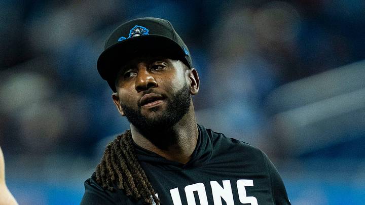 Detroit Lions defensive end Aidan Hutchinson (97) shakes hands with defensive coordinator Kelvin Sheppard ahead of a game against the New Orleans Saints at Ford Field in Detroit on Sunday Sept. 13, 2026.