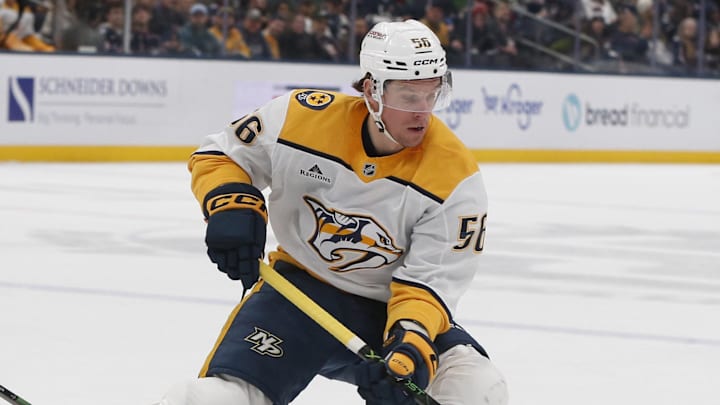 Mar 3, 2026; Columbus, Ohio, USA; Nashville Predators left wing Erik Haula (56) avoids the check from Columbus Blue Jackets defenseman Damon Severson (78) during the first period at Nationwide Arena. Mandatory Credit: Russell LaBounty-Imagn Images