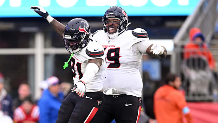 Oct 13, 2024; Foxborough, Massachusetts, USA; Houston Texans running back Dameon Pierce (31) celebrates with guard Shaq Mason (69) after scoring a touchdown against the New England Patriots during the second half at Gillette Stadium. Mandatory Credit: Brian Fluharty-Imagn Images Oct 13, 2024; Foxborough, Massachusetts, USA; Houston Texans running back Dameon Pierce (31) celebrates with guard Shaq Mason (69) after scoring a touchdown against the New England Patriots during the second half at Gillette Stadium. Mandatory Credit: Brian Fluharty-Imagn Images