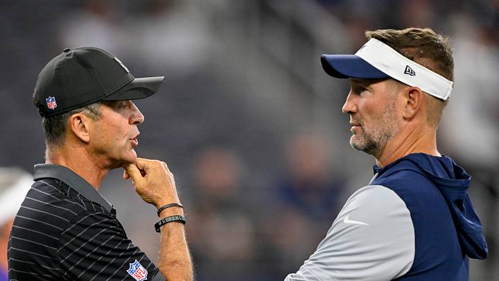 New York Giants head coach John Harbaugh and Dallas Cowboys head coach Brian Schottenheimer