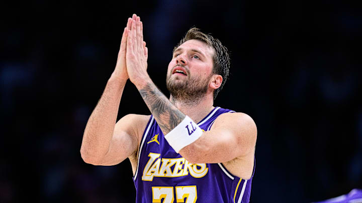 Mar 27, 2026; Los Angeles, California, USA; Los Angeles Lakers guard Luka Doncic (77) gestures during the second half against the Brooklyn Nets at Crypto.com Arena. Mandatory Credit: William Liang-Imagn Images