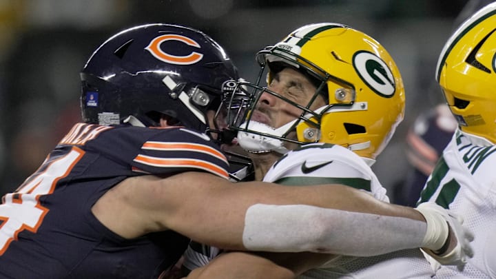 Green Bay Packers quarterback Jordan Love (10) is sacked by Chicago Bears defensive end Austin Booker.