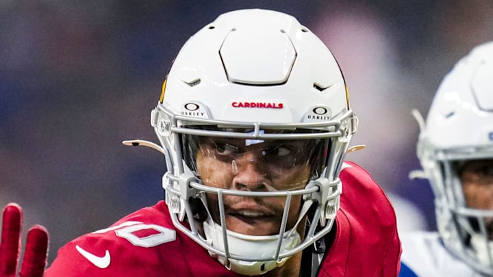 Arizona Cardinals wide receiver Chris Moore (10) stiff arms Indianapolis Colts safety Nick Cross (20) on Saturday, Aug. 17, 2024, before a preseason game between the Indianapolis Colts and the Arizona Cardinals at Lucas Oil Stadium in Indianapolis. Arizona Cardinals wide receiver Chris Moore (10) stiff arms Indianapolis Colts safety Nick Cross (20) on Saturday, Aug. 17, 2024, before a preseason game between the Indianapolis Colts and the Arizona Cardinals at Lucas Oil Stadium in Indianapolis.