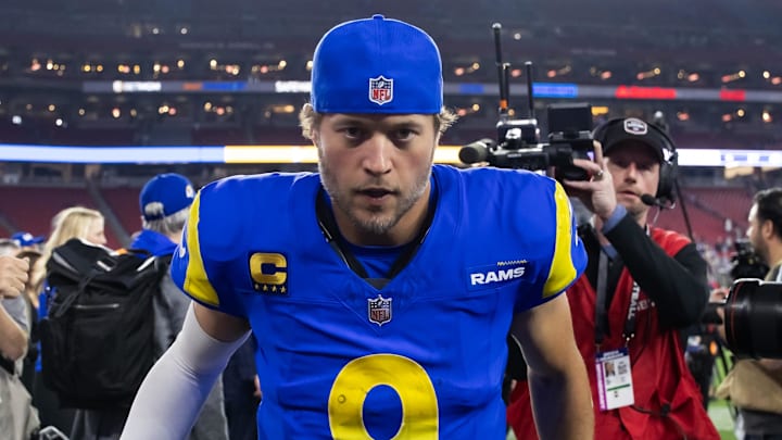 Jan 13, 2025; Glendale, AZ, USA; Los Angeles Rams quarterback Matthew Stafford (9) against the Minnesota Vikings during an NFC wild card game at State Farm Stadium. Mandatory Credit: Mark J. Rebilas-Imagn Images