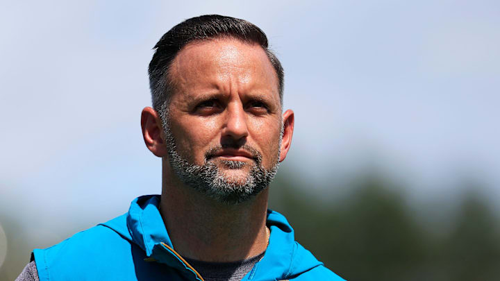 Jacksonville Jaguars defensive coordinator Anthony Campanile walks off the field to be interviewed by media members after an NFL training camp session at the Miller Electric Center, Thursday, Aug. 14, 2025 in Jacksonville, Fla.
