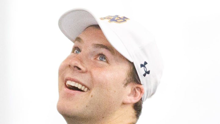 Quarterback Riley Leonard, right, looks on during Notre Dame football's Pro Day 