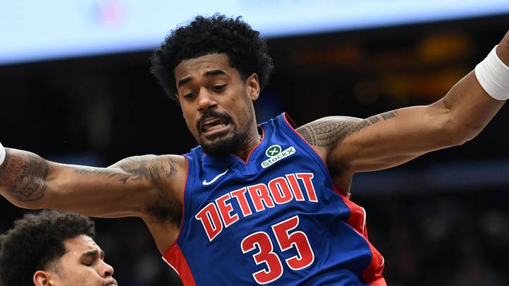 Oct 10, 2026; Washington, District of Columbia, USA;  Detroit Pistons forward Tolu Smith (35) looses control of the ball in front of Washington Wizards forward Kyshawn George (18) during the second quarter at Capital One Arena.  Mandatory Credit: Rafael Suanes-Imagn Images