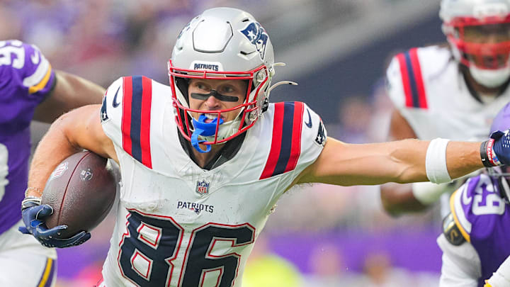 Aug 16, 2025; Minneapolis, Minnesota, USA; New England Patriots wide receiver Efton Chism III (86) runs after the catch against the Minnesota Vikings in the second quarter at U.S. Bank Stadium. Mandatory Credit: Brad Rempel-Imagn Images
