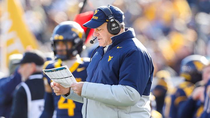 Nov 29, 2025; Morgantown, West Virginia, USA; West Virginia Mountaineers head coach Rich Rodriguez along the sidelines during the first quarter against the Texas Tech Red Raiders at Milan Puskar Stadium. Mandatory Credit: Ben Queen-Imagn Images Nov 29, 2025; Morgantown, West Virginia, USA; West Virginia Mountaineers head coach Rich Rodriguez along the sidelines during the first quarter against the Texas Tech Red Raiders at Milan Puskar Stadium. Mandatory Credit: Ben Queen-Imagn Images