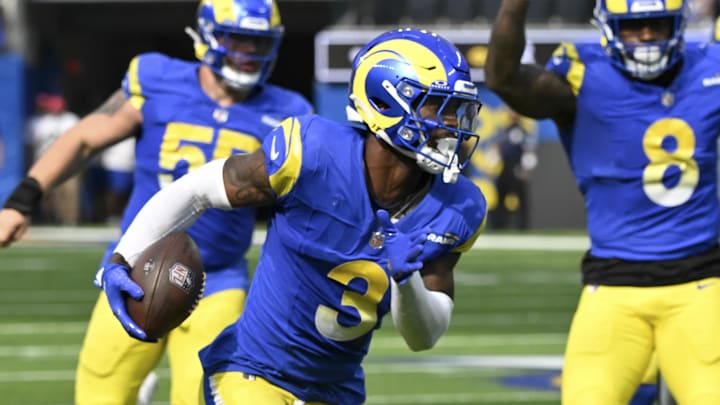 Oct 20, 2024; Inglewood, California, USA; Los Angeles Rams safety Kamren Curl (3) picks up a fumble by Las Vegas Raiders quarterback Gardner Minshew (not pictured)  in the second quarter at SoFi Stadium.Curl ran the ball back for a touchdown. Mandatory Credit: Robert Hanashiro-Imagn Images