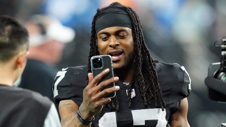 Dec 14, 2023; Paradise, Nevada, USA;  Las Vegas Raiders wide receiver Davante Adams (17) smiles after the game against the Los Angeles Chargers at Allegiant Stadium. Mandatory Credit: Stephen R. Sylvanie-Imagn Images