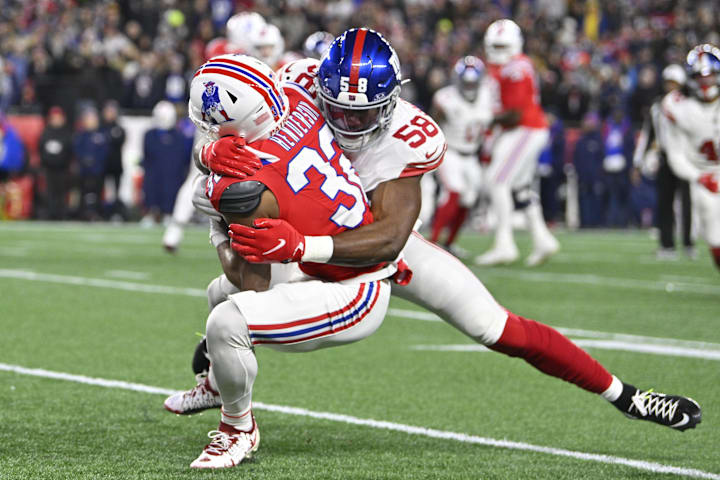 Dec 1, 2025; Foxborough, Massachusetts, USA; New York Giants linebacker Bobby Okereke (58) tackles New England Patriots runni Dec 1, 2025; Foxborough, Massachusetts, USA; New York Giants linebacker Bobby Okereke (58) tackles New England Patriots runni