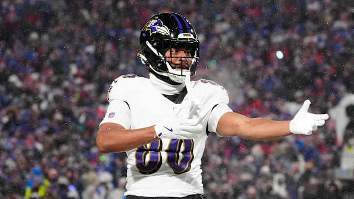 Jan 19, 2025; Orchard Park, New York, USA; Baltimore Ravens tight end Isaiah Likely (80) celebrates after making a catch during the first quarter against the Buffalo Bills in a 2025 AFC divisional round game at Highmark Stadium. Mandatory Credit: Gregory Fisher-Imagn Images