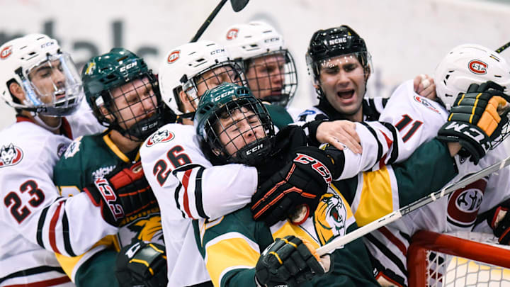 Players clash near the St. Cloud State goal during the Saturday, Oct. 20, game against Northern Michigan at the Herb Brooks National Hockey Center in St. Cloud.