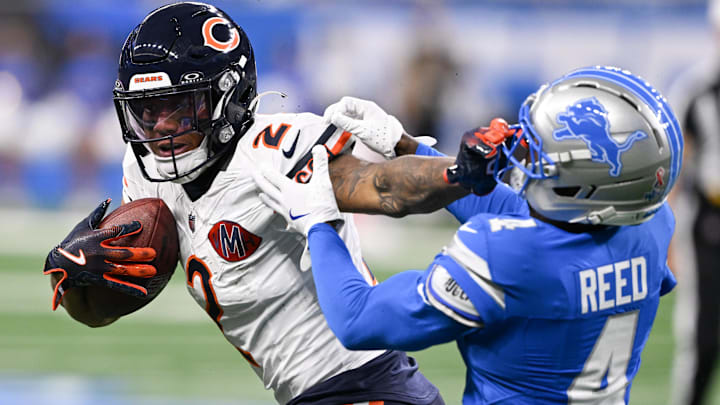 DJ Moore gives D.J. Reed the stiff arm after a reception at Ford Field in a 52-21 Bears loss.