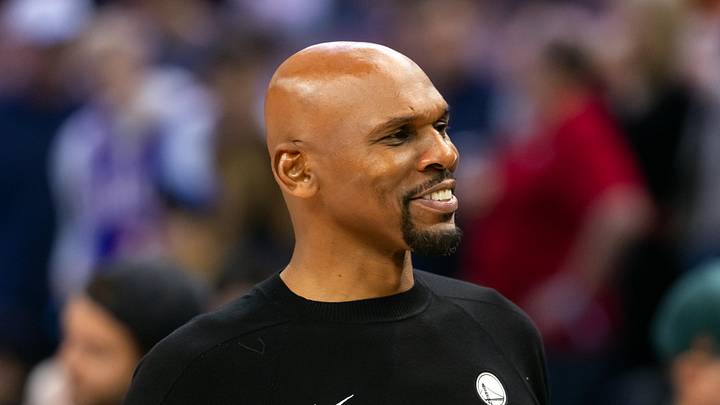 Dec 18, 2025; Phoenix, Arizona, USA; Golden State Warriors assistant coach Jerry Stackhouse against the Phoenix Suns at Mortgage Matchup Center. Mandatory Credit: Mark J. Rebilas-Imagn Images