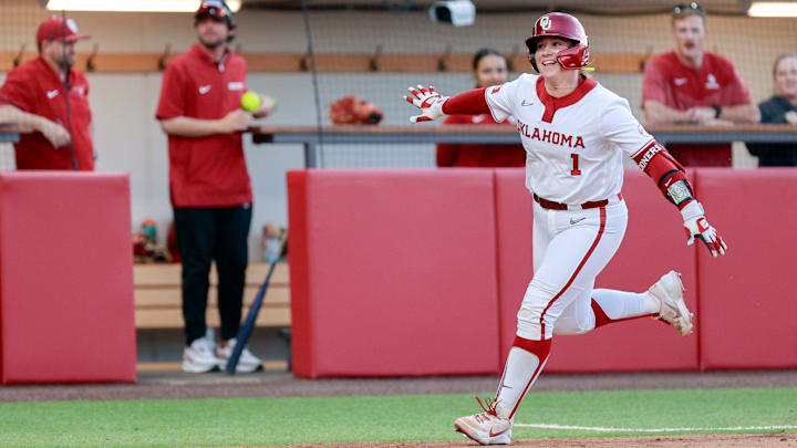 Oklahoma catcher Kendall Wells (1) hits a home run during the home opener softball game between Oklahoma and Alabama State at Love’s Field in Norman Okla., on Thursday, Feb. 26, 2026.