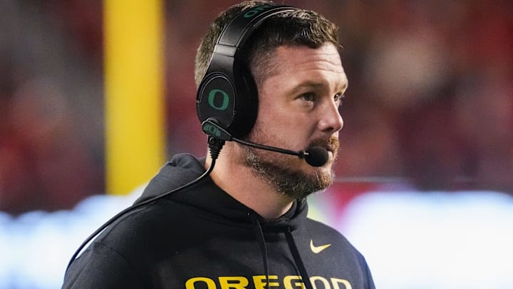 Nov 16, 2024; Madison, Wisconsin, USA;  Oregon Ducks head coach Dan Lanning looks on during the first quarter against the Wisconsin Badgers at Camp Randall Stadium. Mandatory Credit: Jeff Hanisch-Imagn Images