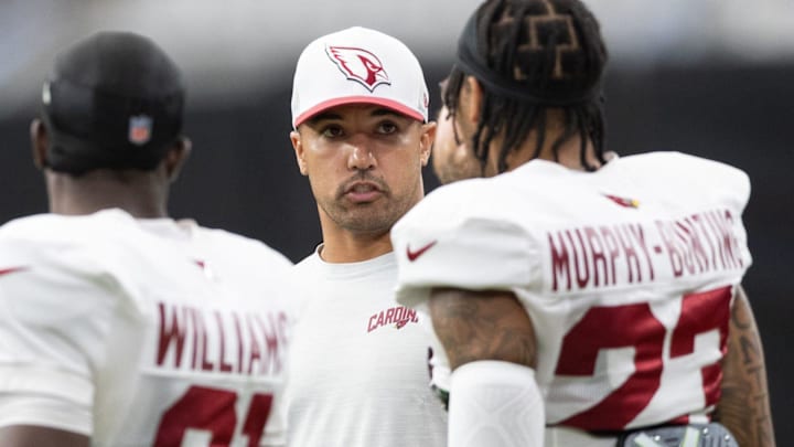 Arizona Cardinals cornerbacks coach Ryan Smith talks to players at training camp at State Farm Stadium in Glendale.