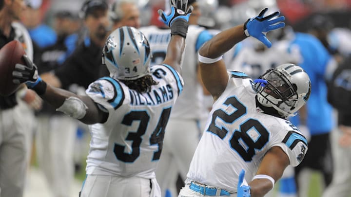 September 20, 2009; Atlanta, GA, USA; Carolina Panthers running back DeAngelo Williams (34) celebrates his touchdown against the Atlanta Falcons with team mat running back Jonathan Stewart (28) in the second quarter at the Georgia Dome. Mandatory Credit: Dale Zanine-Imagn Images