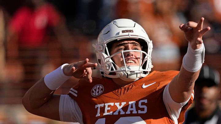 Texas Longhorns quarterback Arch Manning (16) reacts after throwing a touchdown pass in the first half against the Arkansas Razorbacks at Darrell K Royal-Texas Memorial Stadium. Texas Longhorns quarterback Arch Manning (16) reacts after throwing a touchdown pass in the first half against the Arkansas Razorbacks at Darrell K Royal-Texas Memorial Stadium.