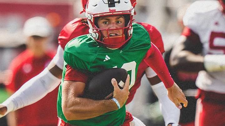 Quarterback Anthony Colandrea runs the ball during a fall camp scrimmage. Quarterback Anthony Colandrea runs the ball during a fall camp scrimmage.