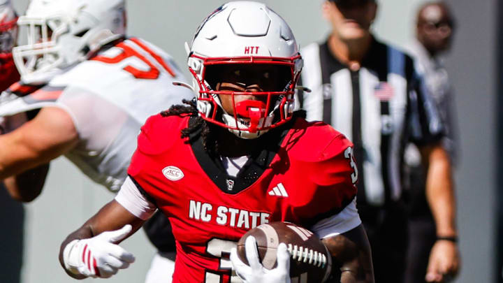 Oct 4, 2025; Raleigh, North Carolina, USA; NC State Wolfpack running back Hollywood Smothers (3) runs with the ball during the first half of the game against Campbell Fighting Camels at Carter-Finley Stadium. Mandatory Credit: Jaylynn Nash-Imagn Images Oct 4, 2025; Raleigh, North Carolina, USA; NC State Wolfpack running back Hollywood Smothers (3) runs with the ball during the first half of the game against Campbell Fighting Camels at Carter-Finley Stadium. Mandatory Credit: Jaylynn Nash-Imagn Images