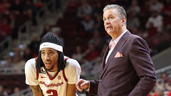 Arkansas Razorbacks point guard Boogie Fland and coach John Calipari talk during the Hogs' 82-57 rout of the UCA Bears at Simmons Bank Arena in North Little Rock Dec. 14.
