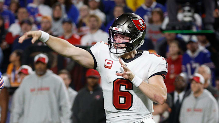 Tampa Bay Buccaneers quarterback Baker Mayfield gets rid of the ball while pressured by Buffalo Bills.
