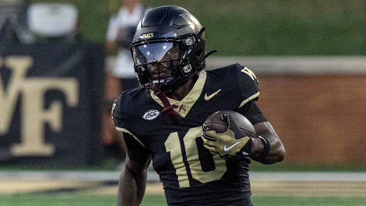 Sep 11, 2025; Winston-Salem, North Carolina, USA; Wake Forest Demon Deacons wide receiver Chris Barnes (10) returns the opening kickoff for a touchdown in the first half against North Carolina State Wolfpack at Allegacy Federal Credit Union Stadium. Mandatory Credit: Luke Jamroz-Imagn Images Sep 11, 2025; Winston-Salem, North Carolina, USA; Wake Forest Demon Deacons wide receiver Chris Barnes (10) returns the opening kickoff for a touchdown in the first half against North Carolina State Wolfpack at Allegacy Federal Credit Union Stadium. Mandatory Credit: Luke Jamroz-Imagn Images