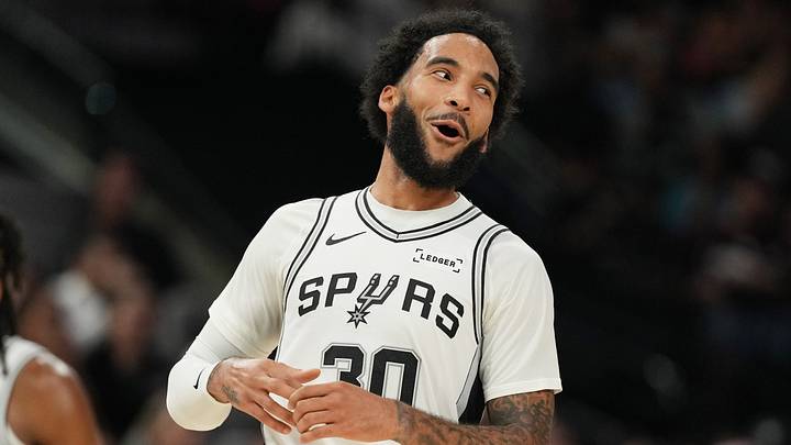 Oct 17, 2025; San Antonio, Texas, USA; San Antonio Spurs forward Julian Champagnie (30) reacts after scoring a three point basket during the second half against the Indiana Pacers at Frost Bank Center. Mandatory Credit: Scott Wachter-Imagn Images