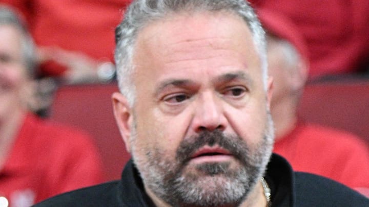 Nebraska Cornhuskers football coach Matt Rhule and Matt Davidson meet before the game