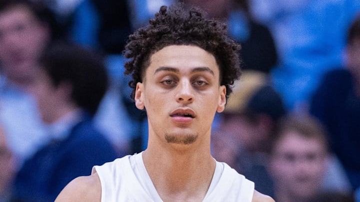 Dec 22, 2025; Chapel Hill, North Carolina, USA; North Carolina Tar Heels guard Kyan Evans (0) brings the ball up court against the East Carolina Pirates during the second half at Dean E. Smith Center. Mandatory Credit: Scott Kinser-Imagn Images