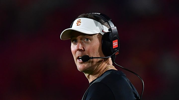 Sep 20, 2025; Los Angeles, California, USA; Southern California Trojans head coach Lincoln Riley watches game action against the Michigan State Spartans during the second half at the Los Angeles Memorial Coliseum. Mandatory Credit: Gary A. Vasquez-Imagn Images